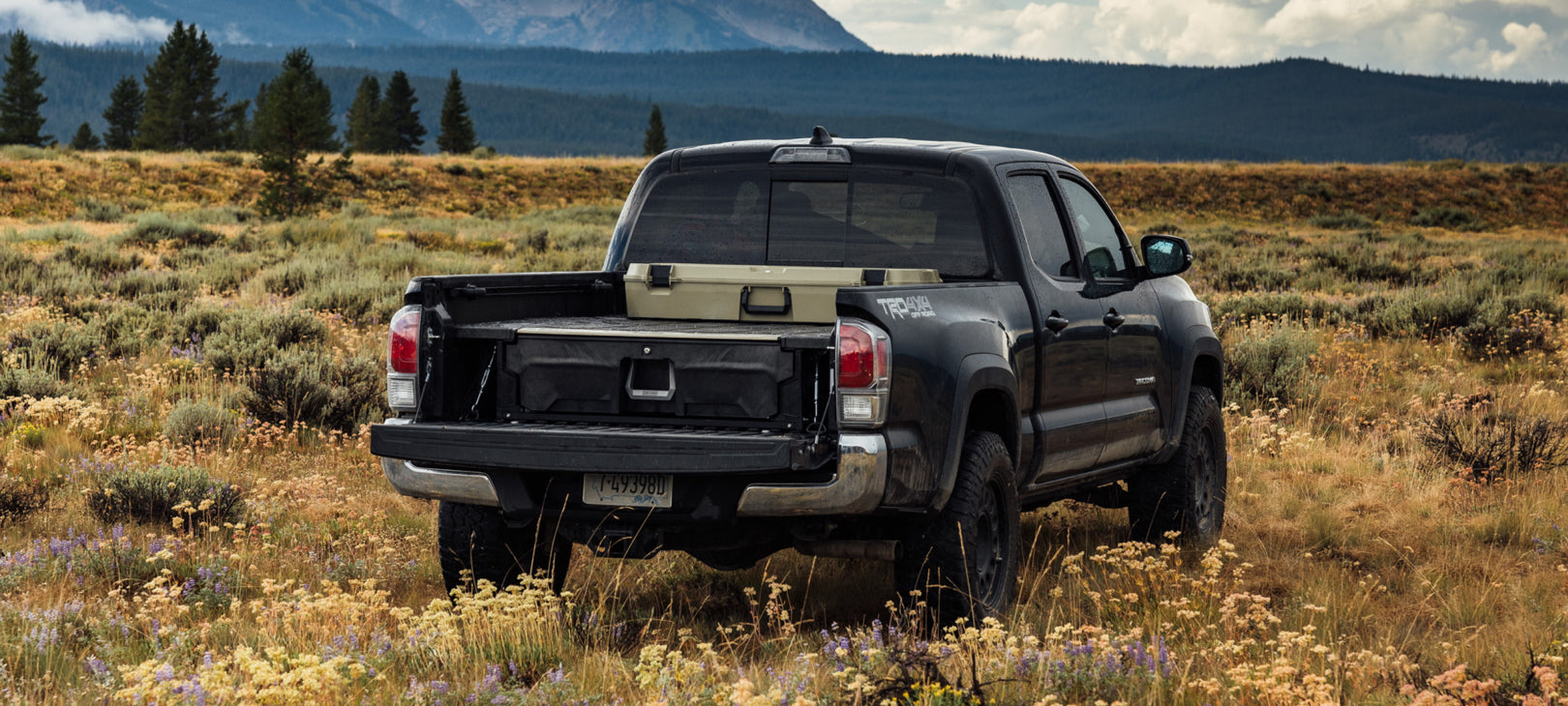 DECKED midsize Drawer System DECKED midsize drawer system in a black pickup parked in the mountains